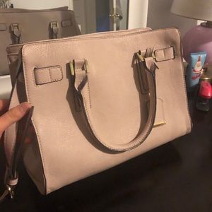 Blush pink purse, lots of compartments